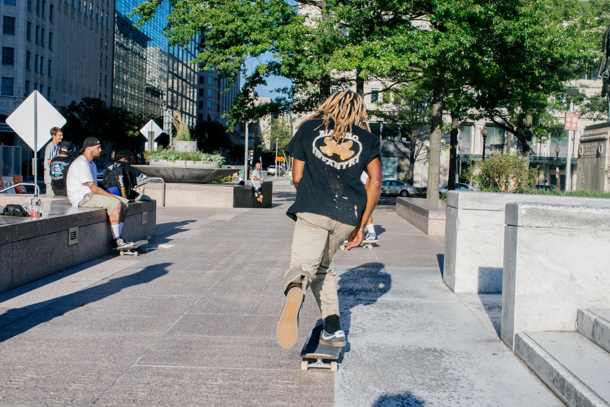 Marino Infantry skater and team in the plaza photographed by Levi Berlin