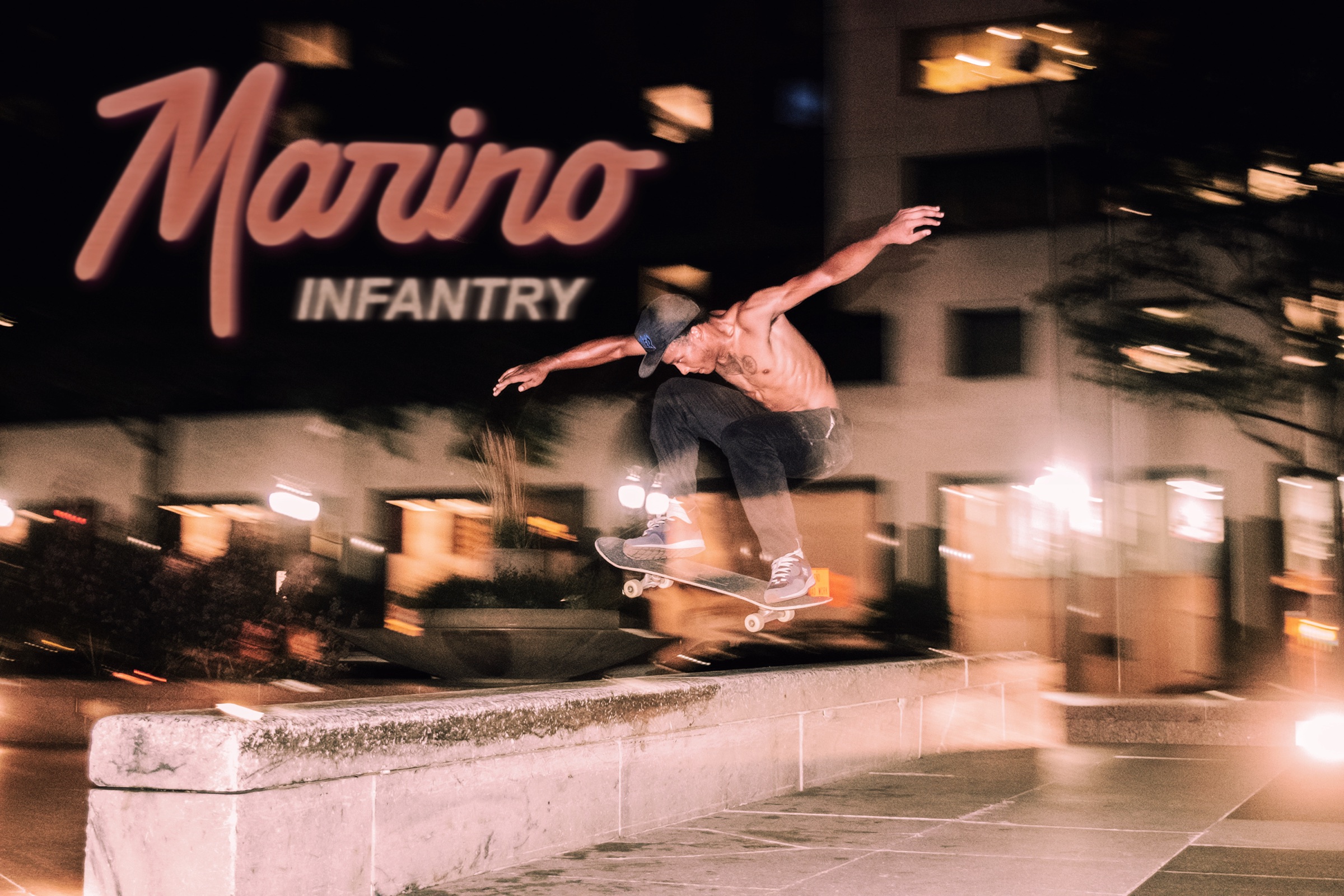 Marino Infantry skater clearing a ledge at night photographed by Levi Berlin