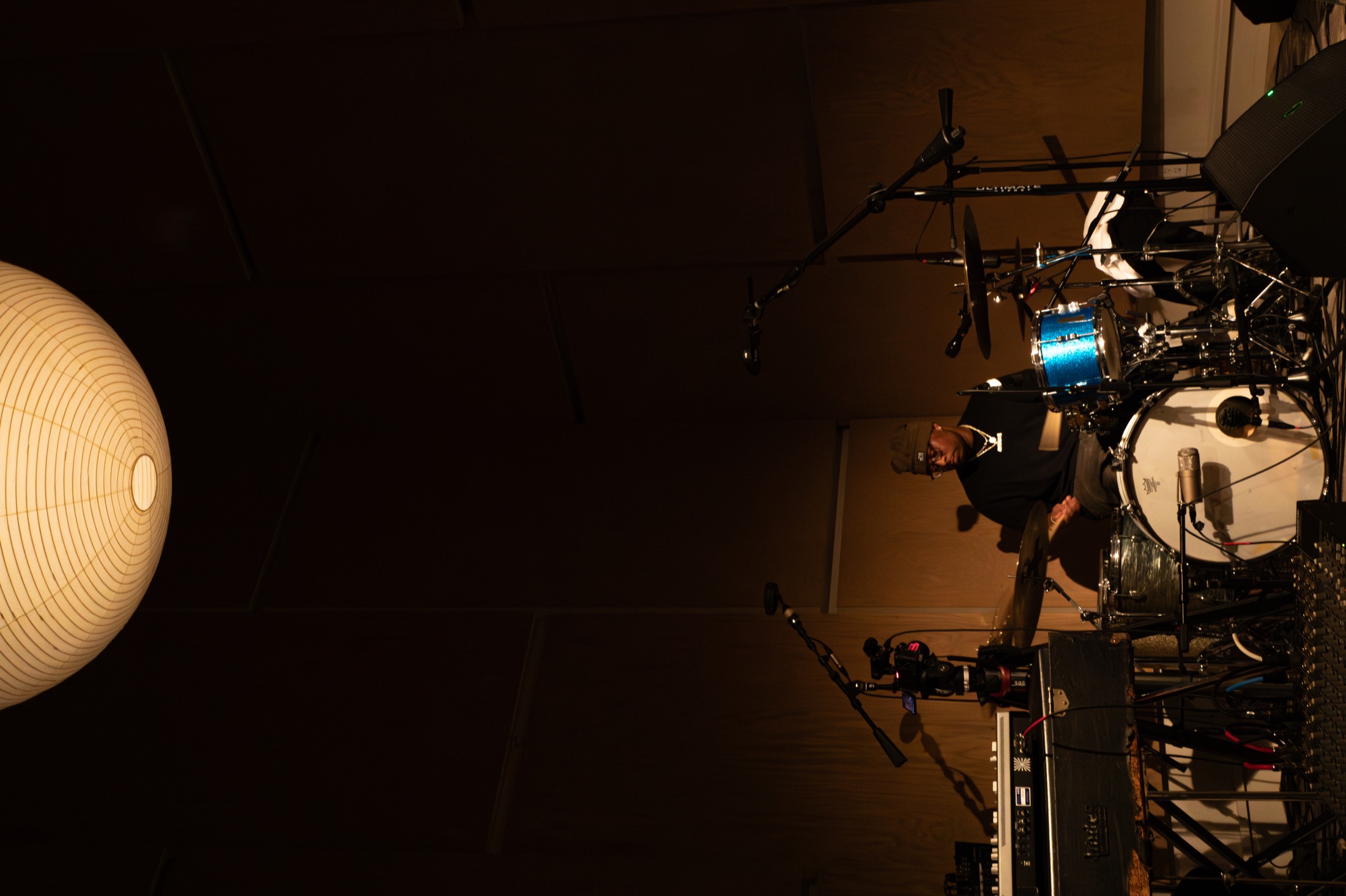 Supah Mario behind the drum kit at Gary’s Electric photographed by Colin Padulo